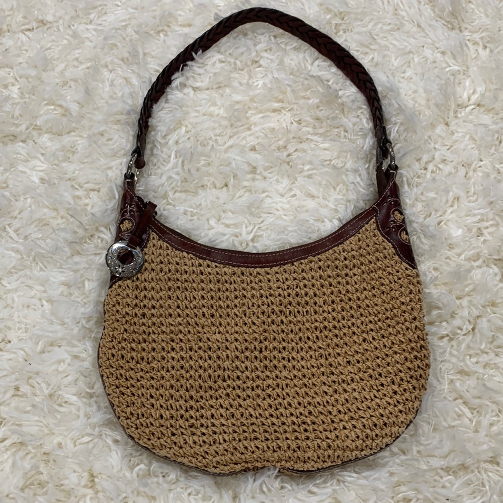 BRIGHTON STRAW AND LEATHER TRIM HOBO BAG WITH BRAIDED STRAP AND SILVER ACCENTS